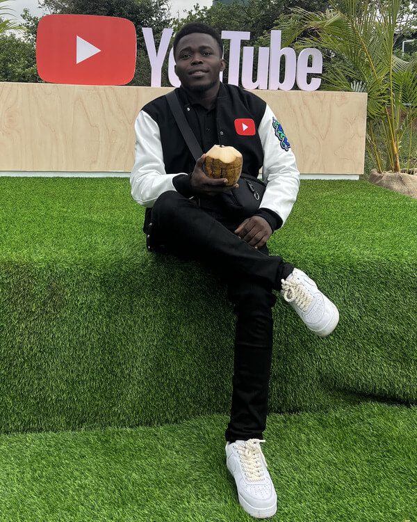 Femi taking a photoshoot at YouTubeBlack
